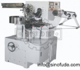 Biscuit flow wrapping machine